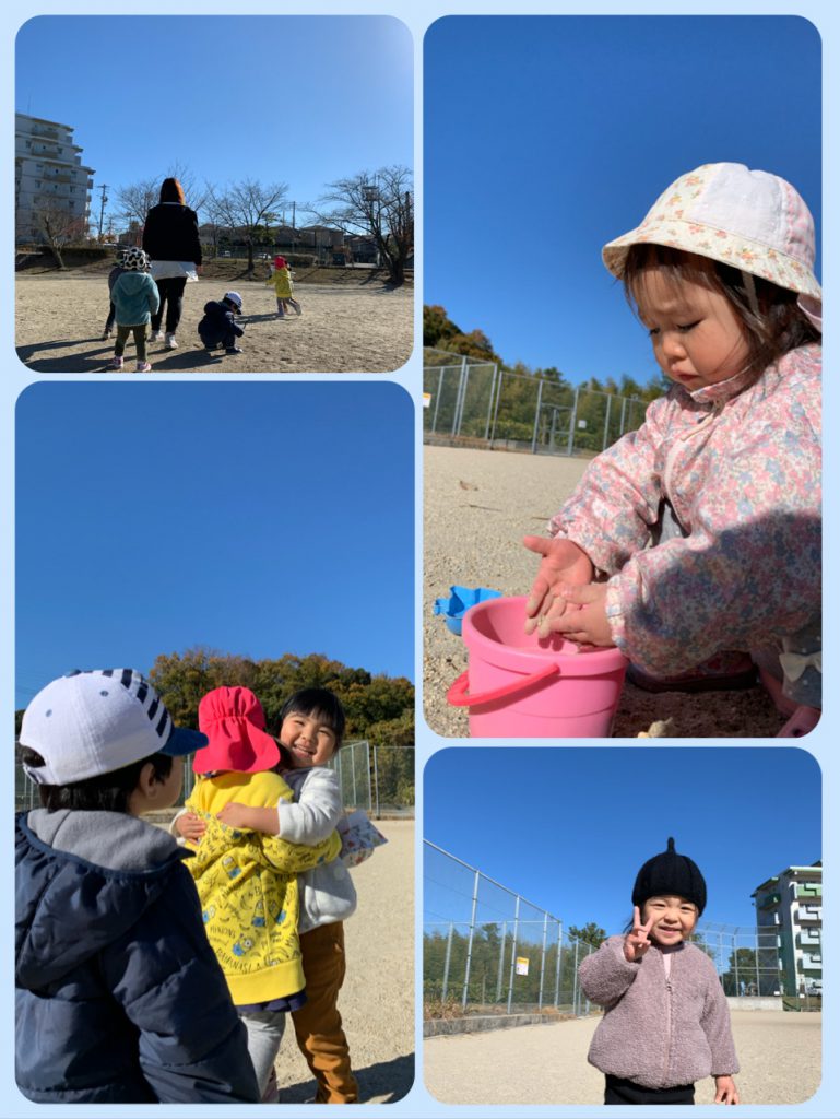 青空の下、グランド遊ぶ園児たち