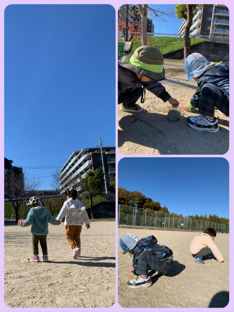 青空の下、グランド遊ぶ園児たち